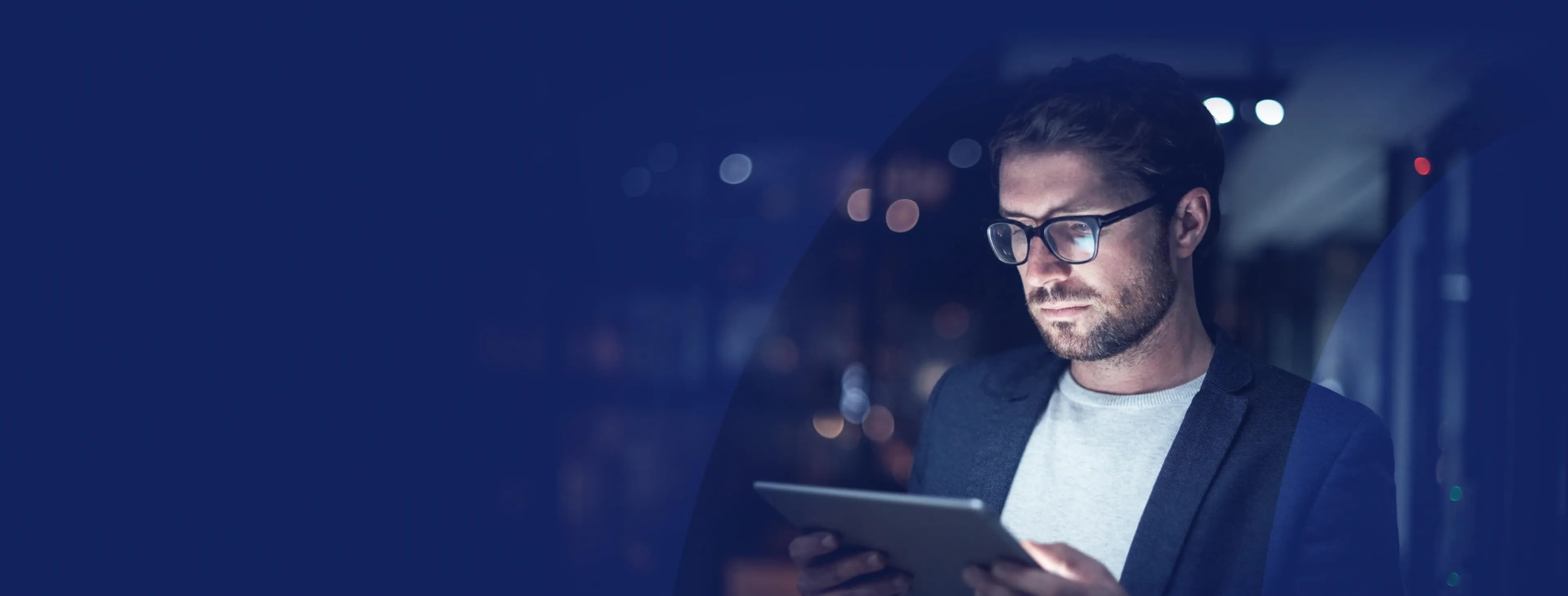 Trader looking at Forex app on a tablet