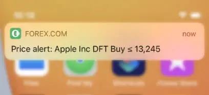 Trading alerts example on the FOREX.com app showing Apple INC DFT Buy